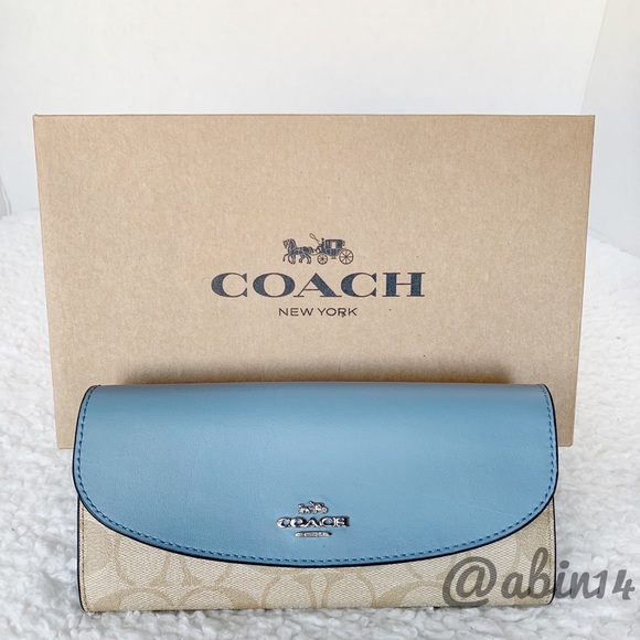Coach Handbags - NWT Coach Signature Slim Envelope Wallet